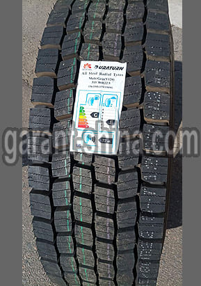 Duraturn Y126 Multi Grip (приводная) 315/80 R22.5 156/150L 18PR - Фото протектора с этикеткой вблизи